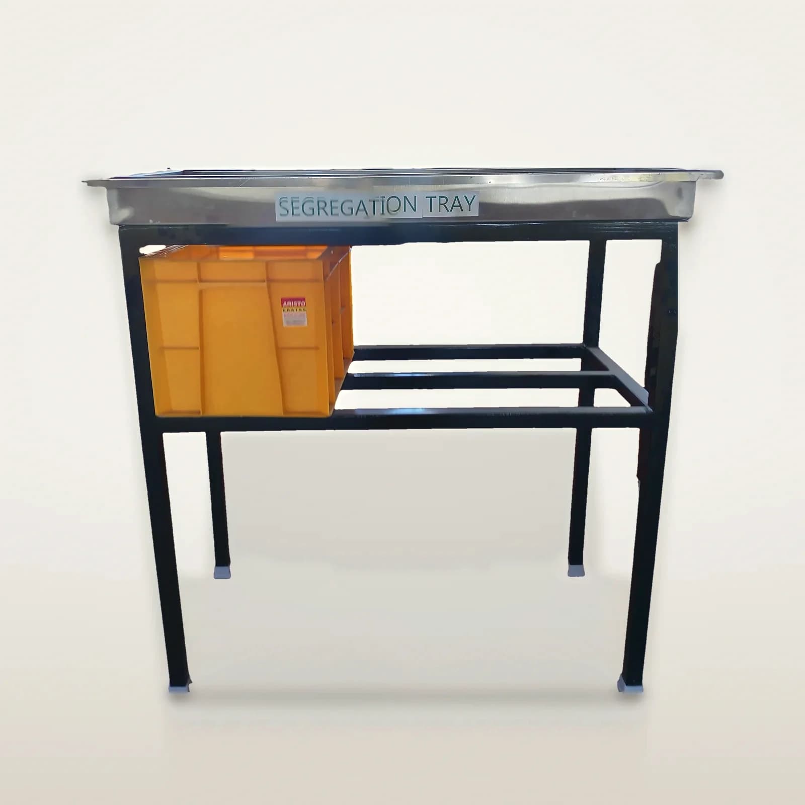 Innovus segregation table: stainless tray on a black steel frame with a yellow crate on the shelf below